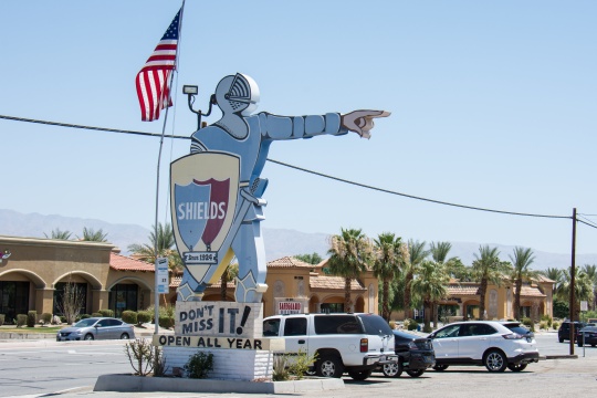 JULY 1 2017 - INDIO, CALIFORNIA: Sign for the Shields Date Farm, a popular tourist attraction, gift shop, and restaurant serving famous Date Milkshakes