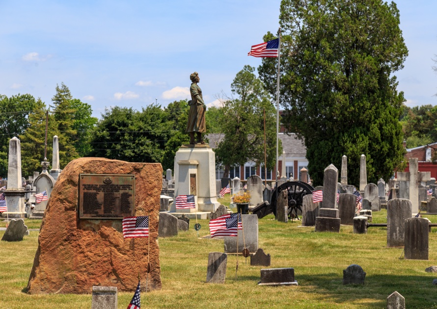 Carlisle, PA, USA – June 26, 2016: The Mary Ludwig Hays - better known as Molly Pitcher - gravesite, located in the Old Graveyard Cemetery, includes a statue of 