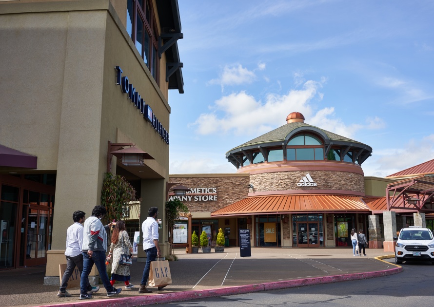 Woodburn, OR - May 25, 2020: Woodburn Premium Outlets, an outlet mall in Oregon, reopens on Memorial Day weekend amid coronavirus pandemic. Stores have occupancy limits while some opt to stay closed.
