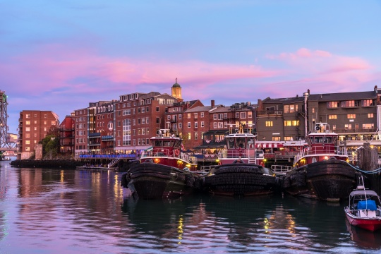 View of Portsmouth waterfront at dusk. New Hampshire, USA.