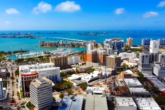 Stunning panoramic aerial view of downtown Sarasota, John Ringling's flyover, Sarasota Bay, Lido Key, and Longboat Key.