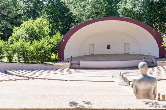 SHREVEPORT, LOUISIANA - MAY 25, 2019: Historic Centenary College Amphitheater with life size Borders series sculptures periodically seated.