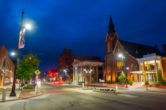 NASHUA, NH, USA - AUG. 1, 2018: Main Street United Methodist Church at night in downtown Nashua, New Hampshire, NH, USA.