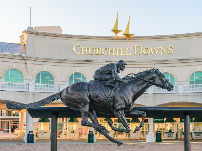 LOUISVILLE, KENTUCKY, USA - APRIL 3 2016: Entrance to Churchill Downs featuring a statue of 2006 Kentucky Derby Champion Barbaro.