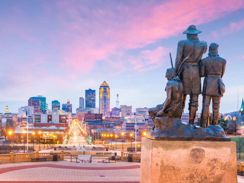 The Des Moines Iowa Skyline in America with The Territory's Ancient Pioneer Statue (over 60 years old) was completed in 1892