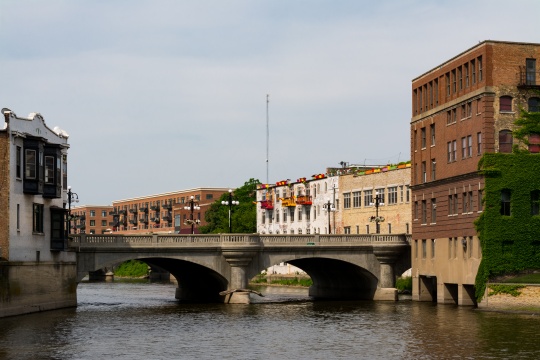 Downtown buildings on the Fox River. Aurora, Illinois, USA