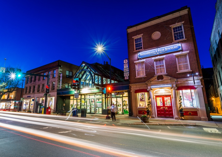 Cozy little downtown of Brattleboro, Vermont at night. City, center.