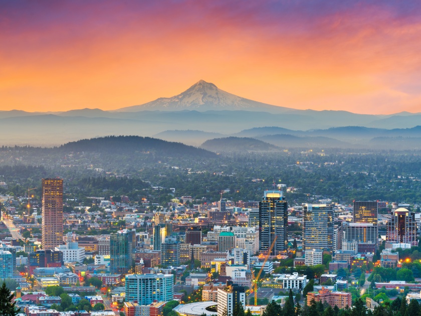 Portland, Oregon, USA downtown with Mt. Hood at sunrise.