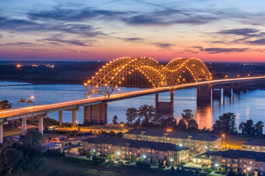 Memphis, Tennessee, USA on the Hernando de Soto Bridge at sunset.