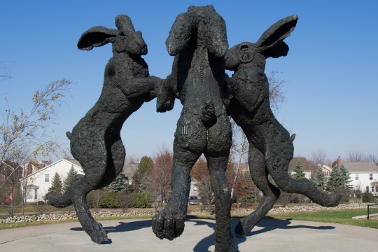 Dancing up hare sculpture close up in a park in the Ballantrae neighborhood in Dublin, Ohio