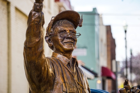 Statue of a bird watcher in downtown Kingsport, TN on April 1, 2019.