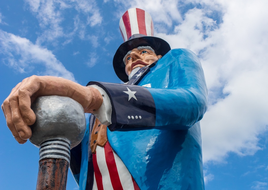 Danbury, Connecticut / USA - August 4 2019: Looking up at the world's tallest Uncle Sam. Standing 38 feet tall, this fiberglass statue is located at the Danbury Railway Museum.