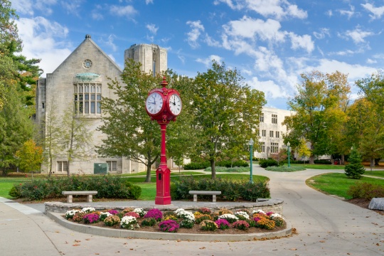 BLOOMINGTON, IN/USA - OCTOBER 22, 2017: Landmark campus clock and logo on the campus of the University of Indiana.